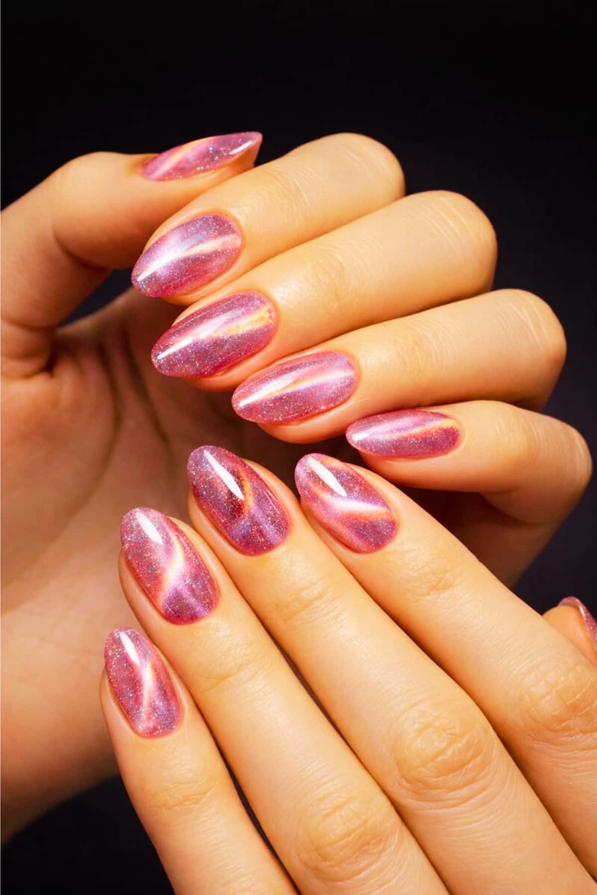 Cat eye jelly gel nail polish manicure with holographic shimmer and translucent purple pink tones
