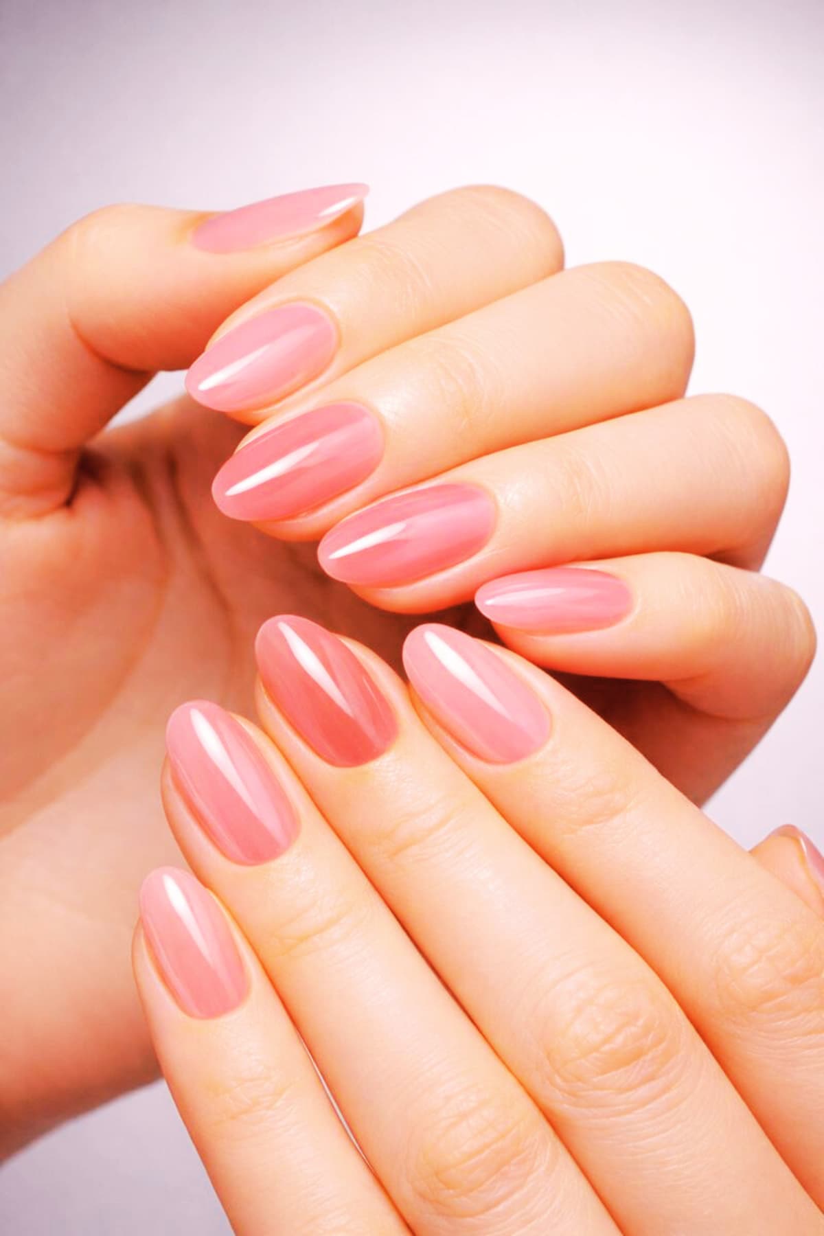 Sheer nail blush manicure with translucent jelly finish and soft rosy tint for natural glossy nails