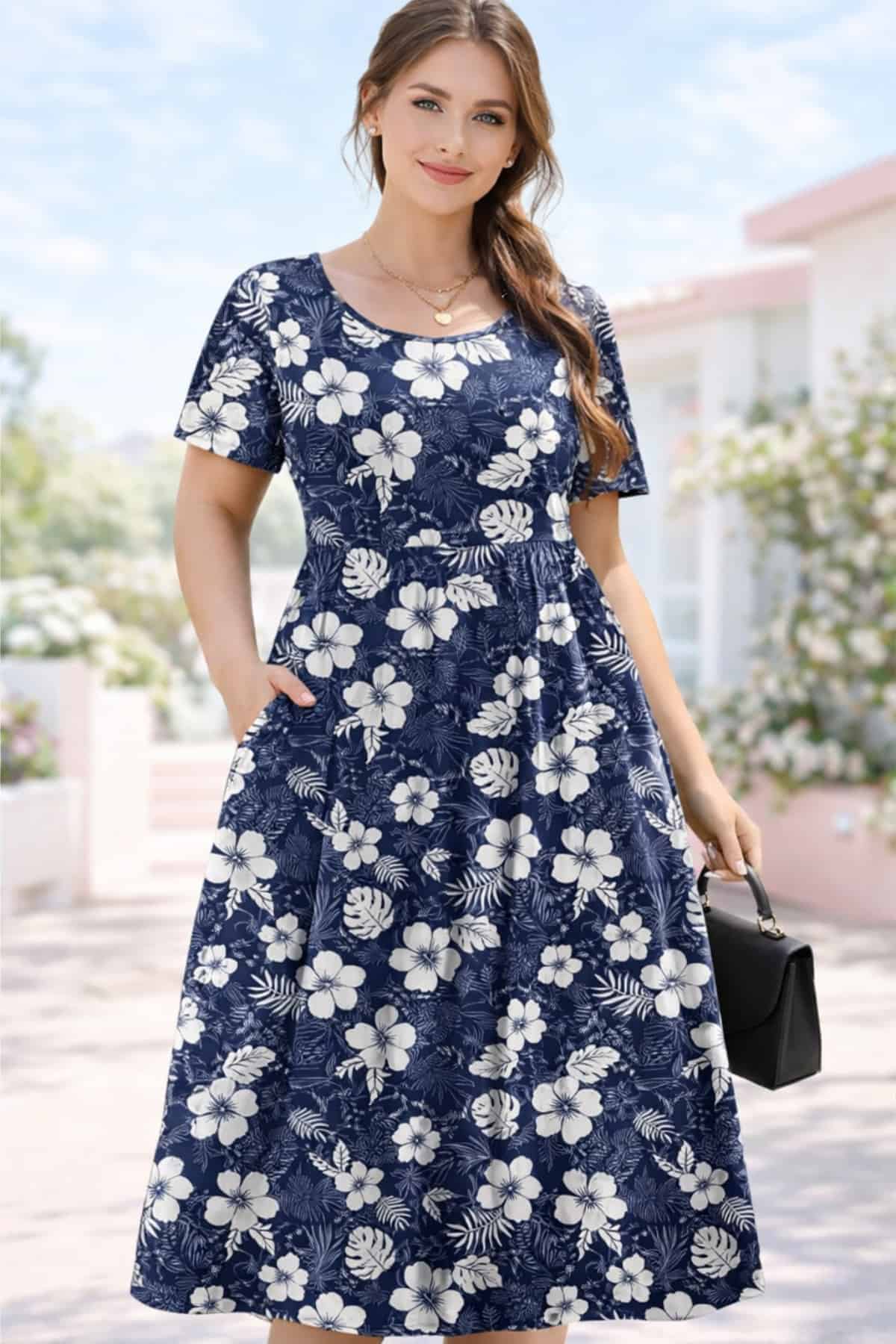 summer floral A-line dress — young woman with clear glowing skin, bright blue eyes, brown silky hair, fit toned body, peaceful confident expression in a soft summer outdoor setting